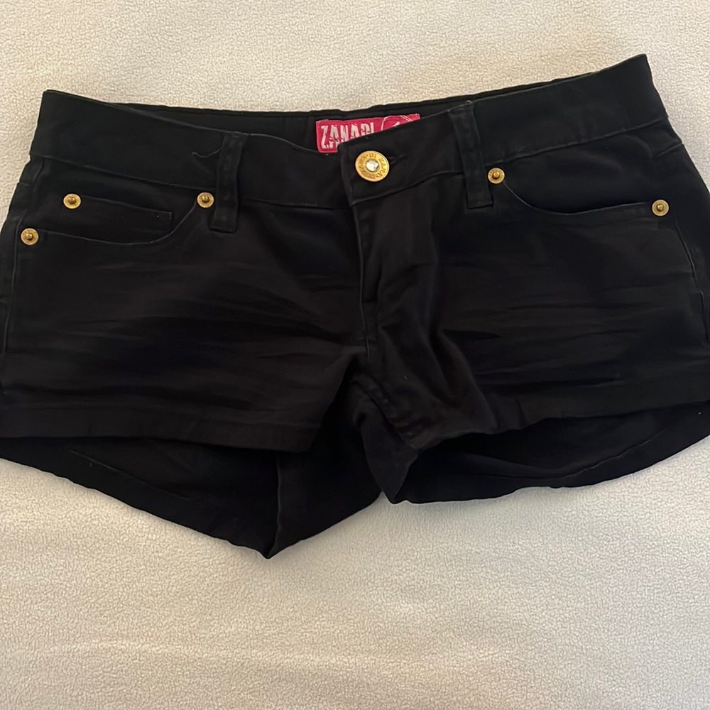 Black shorts. Very short.